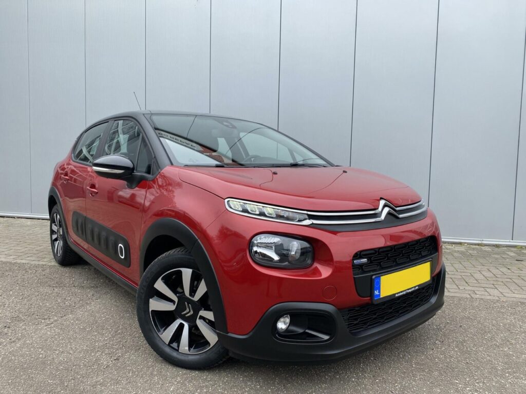 Rode Citroën C3, bij Autobedrijf Pompstra